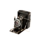 An Unmarked Folding Camera,