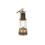 A Miner's Bainbridge Lamp,