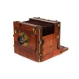 A Wratten & Wainwright Half Plate Mahogany Tailboard Camera,