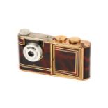 A Kunik Walter Petie Vanity Sub-Miniature Camera,
