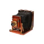 A Thornton Pickard "Amber" Half Plate Mahogany Field Camera,