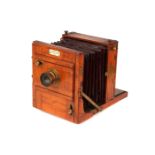 A Perken, Son & Rayment Half Plate Mahogany Tailboard Camera,