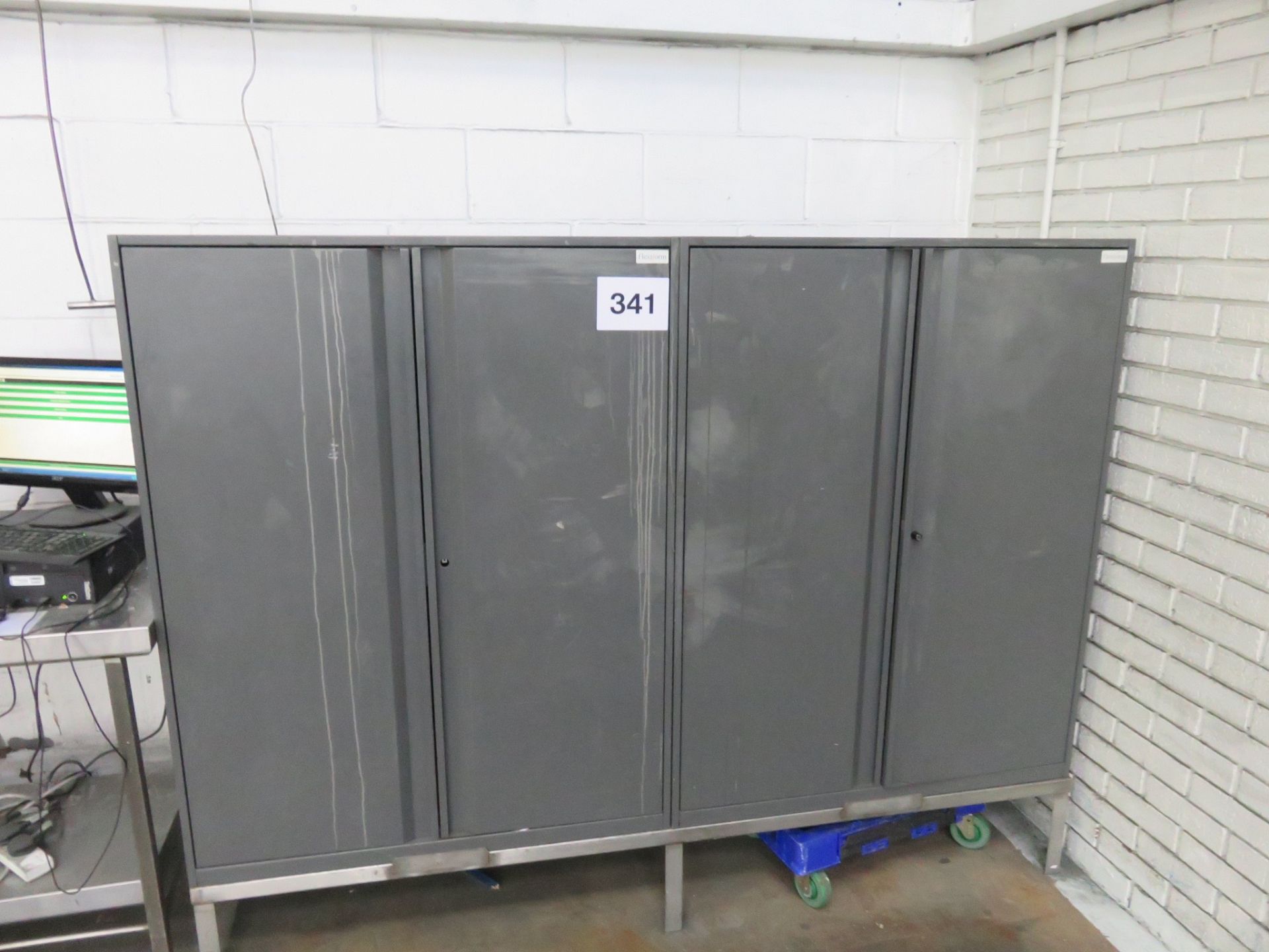 Cupboard 4 doors with selves. 2000mm long x 500mm deep x 1500mm high . Lift Out £30