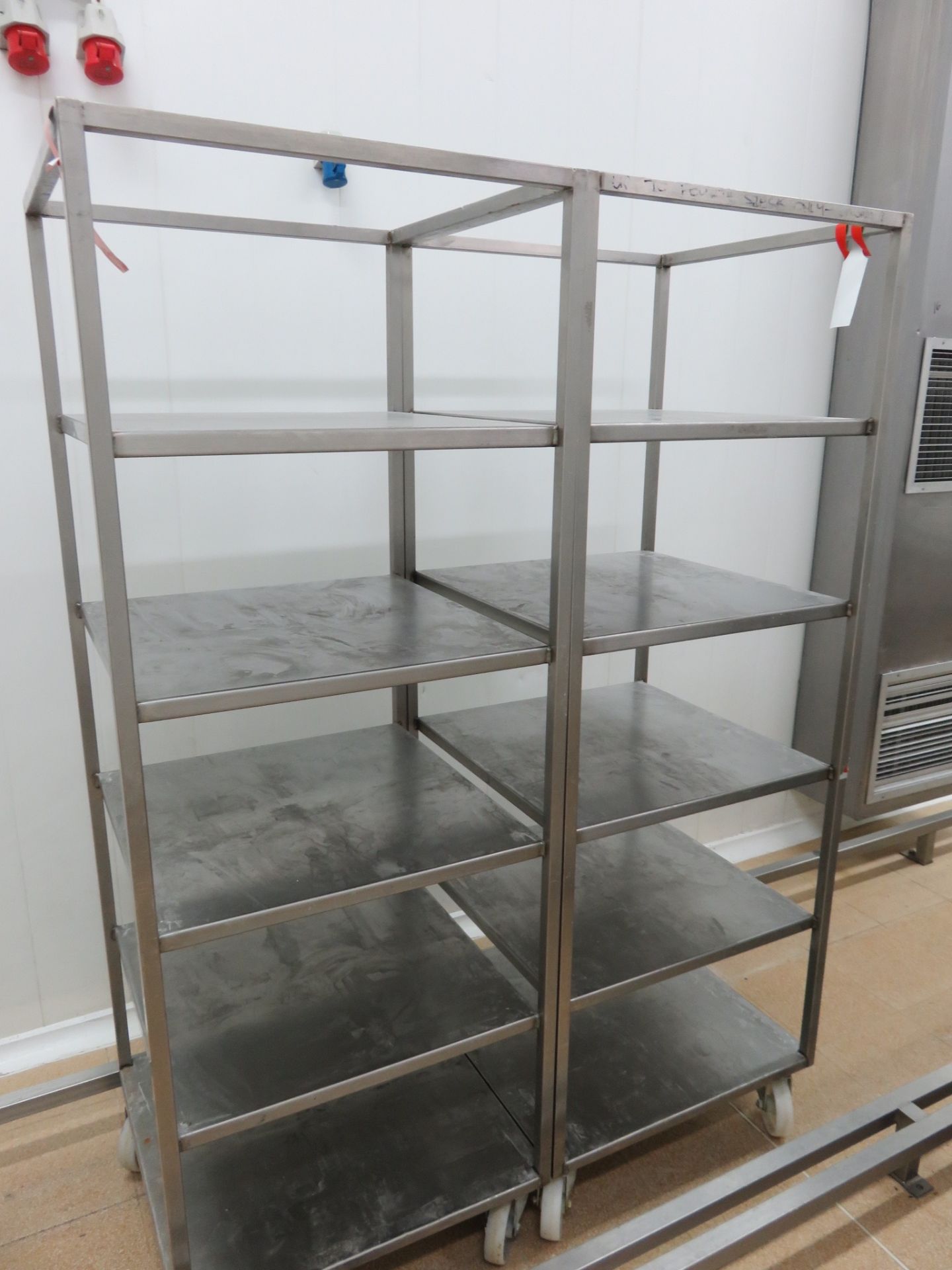2 x S/s mobile trollies with 5 shelves. Approx. 600mm x 600mm x 1800mm high. Lift Out £10