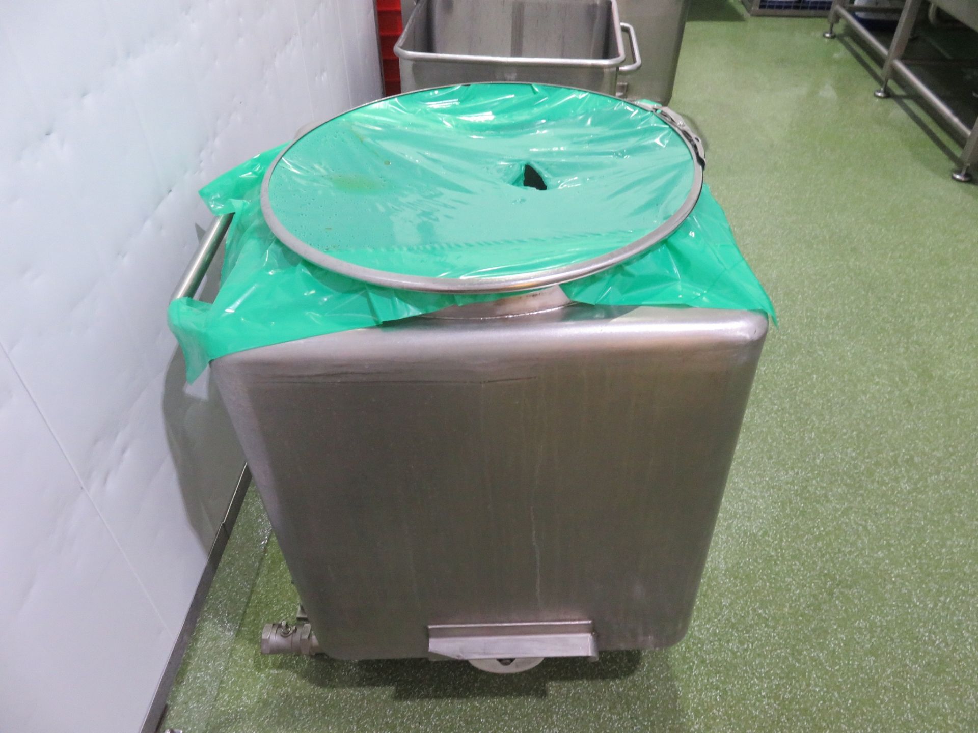 2 x S/s Mobile liquid bins with bottom side discharge. Approx. 600 x 600 x 880mm high. Lift out £20
