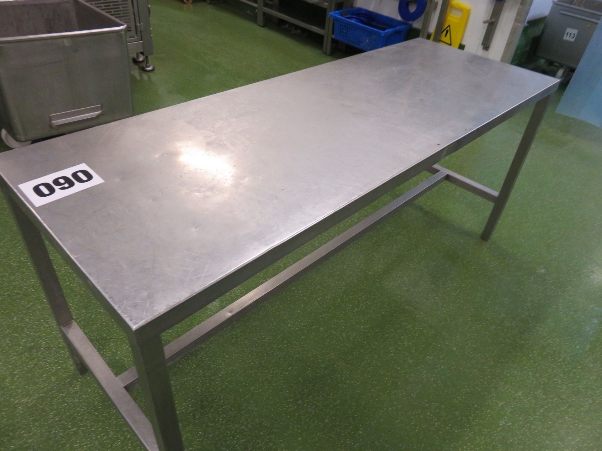 S/s Table. Approx. 1800mm x 650mm. Lift out £10