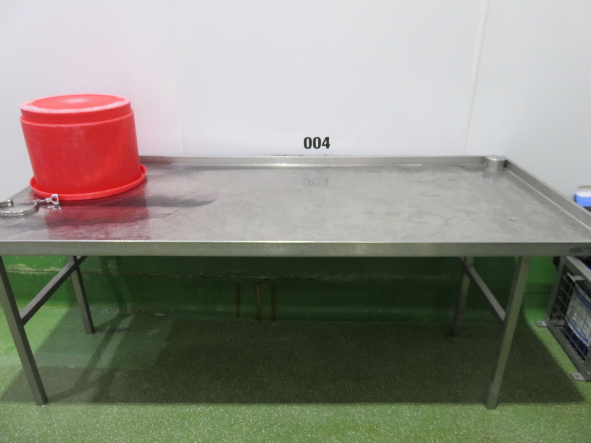 S/s table 1.9 x 670mm. Lip on two sides. Lift Out £10
