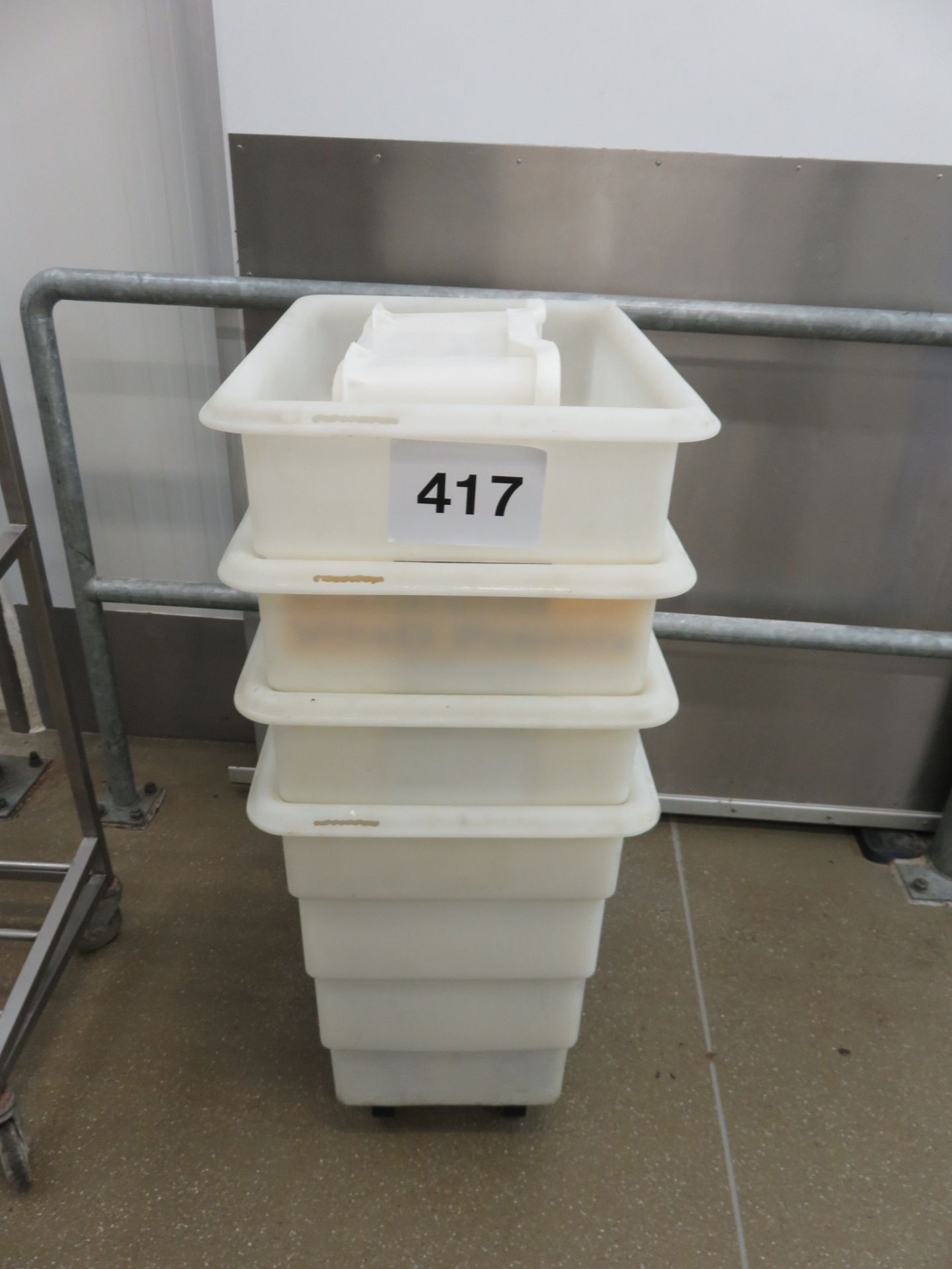 5 x plastic Bins on Dollie. Approx. 380mm x 520mm x 600mm deep. Lift out charge £10