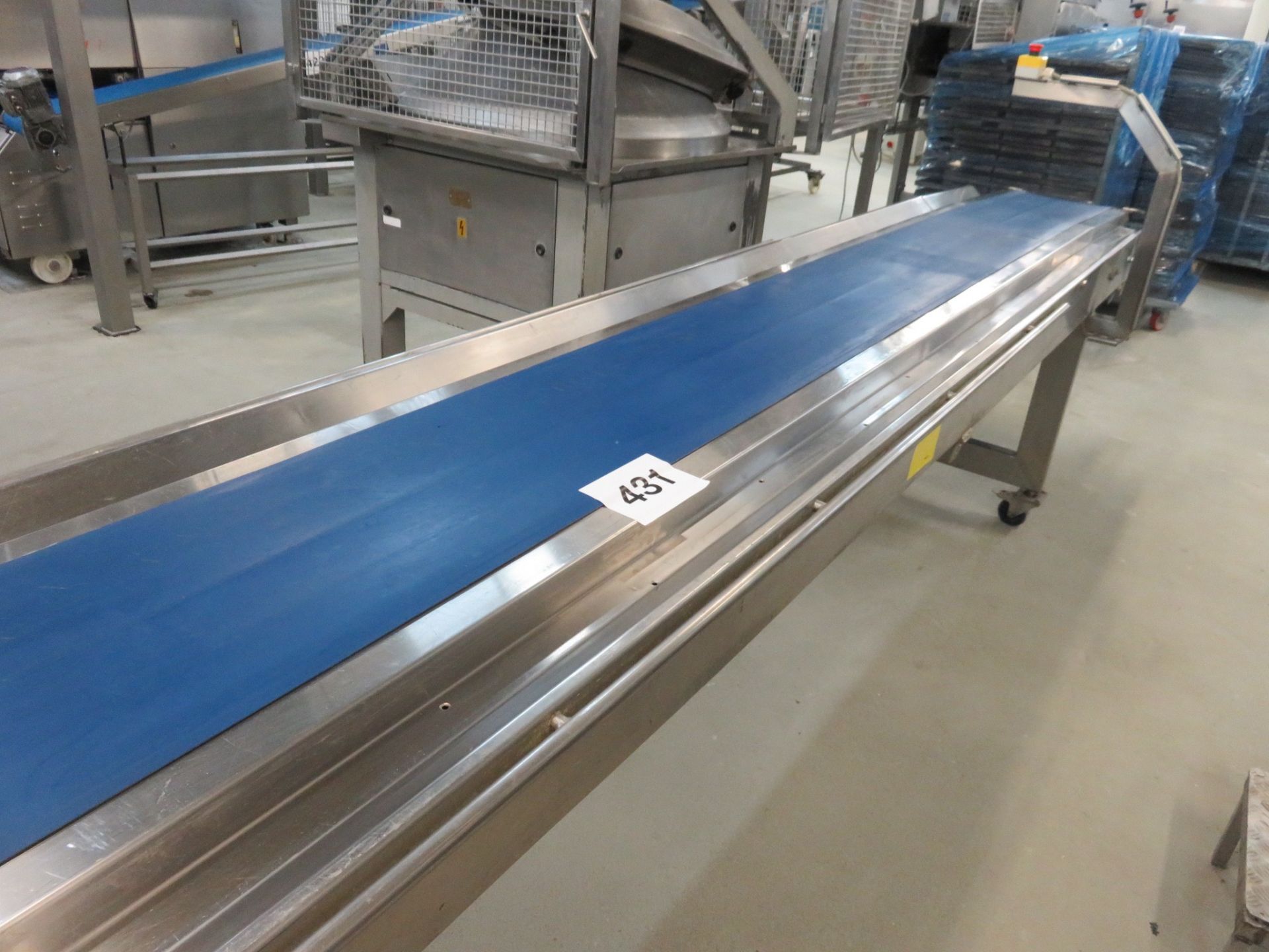 Conveyor with guttering. Approx. 4400mm long x 350mm wide blue neoprene belt. Lift out charge £80