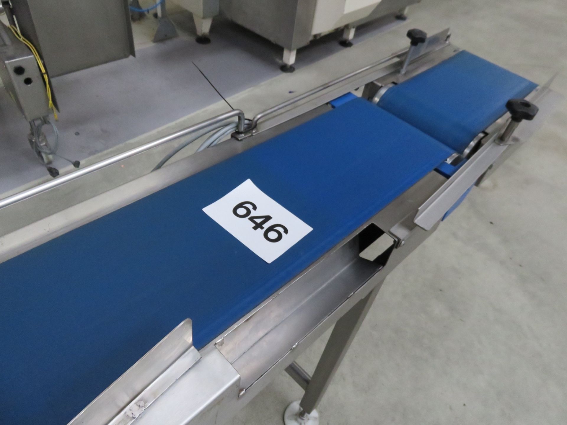 Conveyor 250mm wide blue neoprene belt. Overall 2.2 meters long. S/s. Lift out charge £30