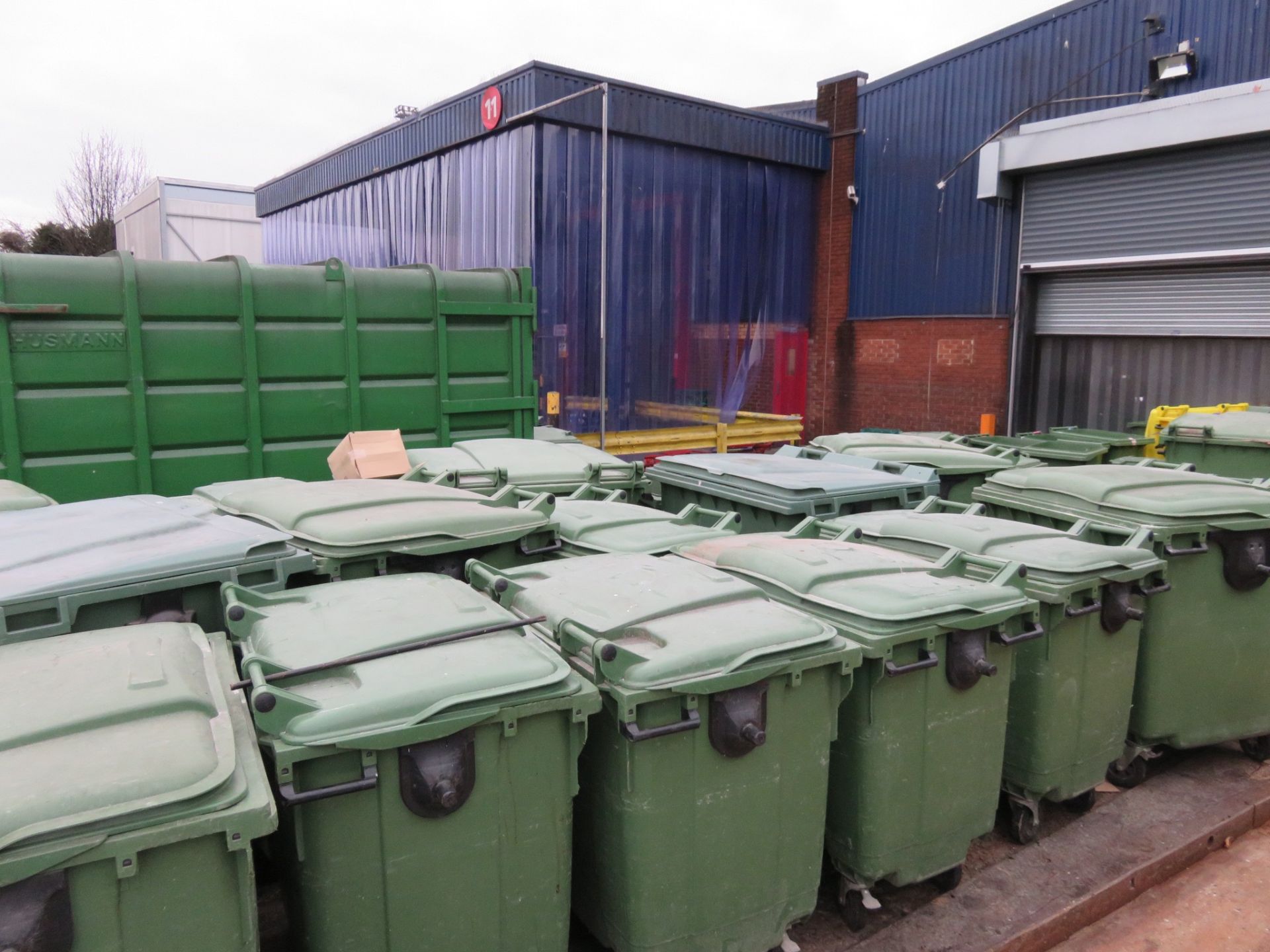 4 x Green Wheelie Bins 2 wheels some with lids. Approx. 500 x 560 x 1000mm. Lift out charge £5