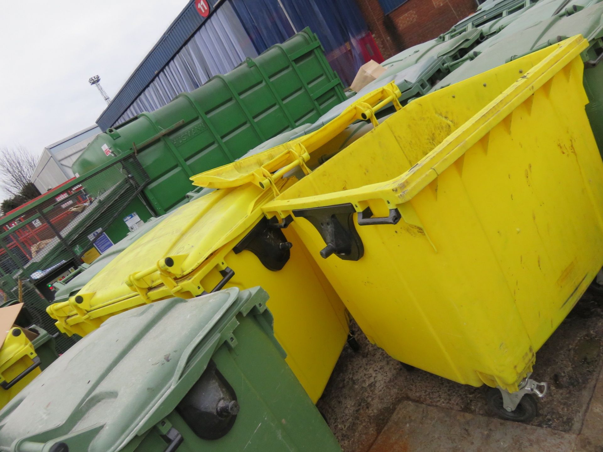 3 x Yellow Wheelie Bins some with lids. Approx. 1100 x900 x 1500mm high. Lift out charge £5