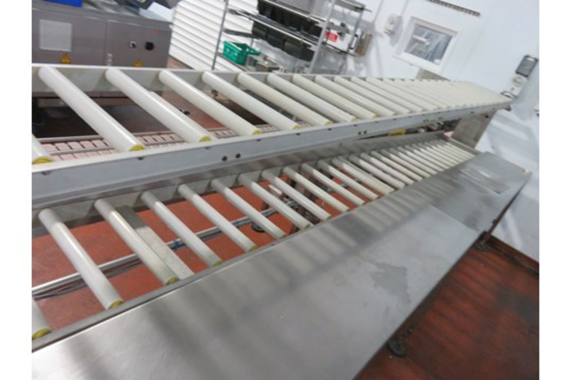 2 tier Packing Conveyor with roller conveyor 4 meters long x 400mm wide roller. Lift Out £60