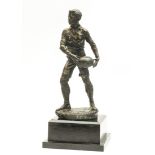 Rugby.- [Player Passing Ball], heavy bronzed figure, early 20th Century.