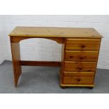 A pine dressing table / desk, with four pedestal drawers, 75 x 106cm