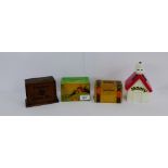 A collection of four vintage money boxes to include Snoopy etc., (4)