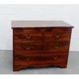 A mahogany chest, the rectangular top above two short and two long drawers over a shaped apron base,