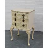 A shabby chic white painted bedside cabinet, 70 x 46cm