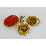 9 carat gold framed orange agate brooch together with two yellow metal paste set brooches (3)