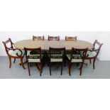 A mahogany dining suite comprising a twin pedestal extending table with extra leaf and set of