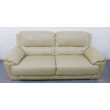 A contemporary beige leather two seater sofa on chrome feet, 220cm