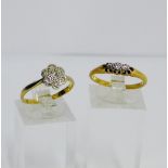 An 18 carat gold diamond set flowerhead dress ring together with an 18 carat gold three stone