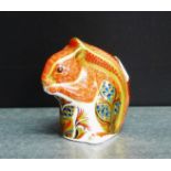 A Royal Crown Derby 'Imari' patterned paperweight in the form of a Squirrel, with gold stopper,