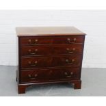 A mahogany chest, the rectangular top with moulded edge over four graduating long drawers, on