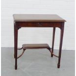 A small mahogany side table, with carved frieze and square tapering supports and spade feet, 74 x