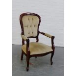 A stained hardwood framed open armchair with upholstered button back and seat, 102 x 63cm