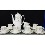 A Spode bone china 'Gothic' patterned coffee set comprising coffee pot, cream jug, sugar bowl, six