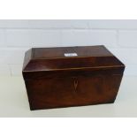 A mahogany sarcophagus tea caddy, the hinged lid opening to reveal three divisions with lion ring