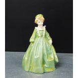 A Royal Worcester china figure 'Grandmother's Dress', modelled by F.G. Doughty, 17cm high