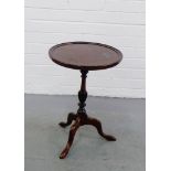 A mahogany wine table, the circular dished top on tripod support, 52 x 36cm