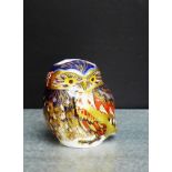 A Royal Crown Derby porcelain paperweight in the form of an Owl, with a silver stopper, 8cm high
