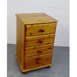 A pine four drawer bedside chest, 74 x 45cm