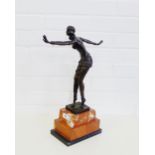 After Chiparus Bronze female Art Deco style figure on a red and black hardstone base, 48cm high