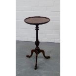 A mahogany wine table on tripod supports, 56 x 30cm