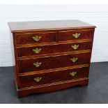 A burr walnut chest, the rectangular top with moulded edge over two short and three long