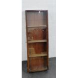 A wall hanging display cabinet with glazed front and sides 125 x 44cm