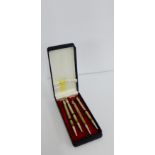 A set of four Sterling silver bridge pencils (4)