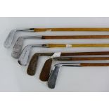 Two Hickory shafted vintage putters and four clubs, (6)