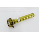 A vintage brass Oldham & Son Ltd, Denton of Manchester type TDi flashlight, 25cm long