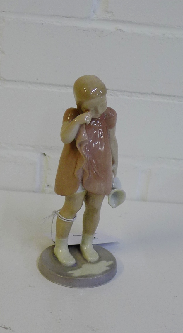 A Bing and Grondahl porcelain figure of a girl, with printed backstamps and numbered 2246, 17cm