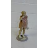 A Bing and Grondahl porcelain figure of a girl, with printed backstamps and numbered 2246, 17cm