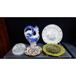 A Philomena Pretsell plate, a Quimper plate, a Villeroy & Boch American sampler pattern plate and