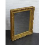 A gilt framed rectangular wall mirror