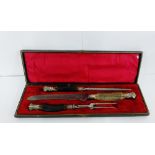 Three piece horn handled carving set,in fitted case