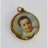 9 carat gold framed circular portrait miniature of a boy child dressed in a sailors suit, 4cm