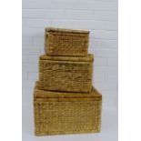 A set of three graduated rectangular wicker baskets, (3)